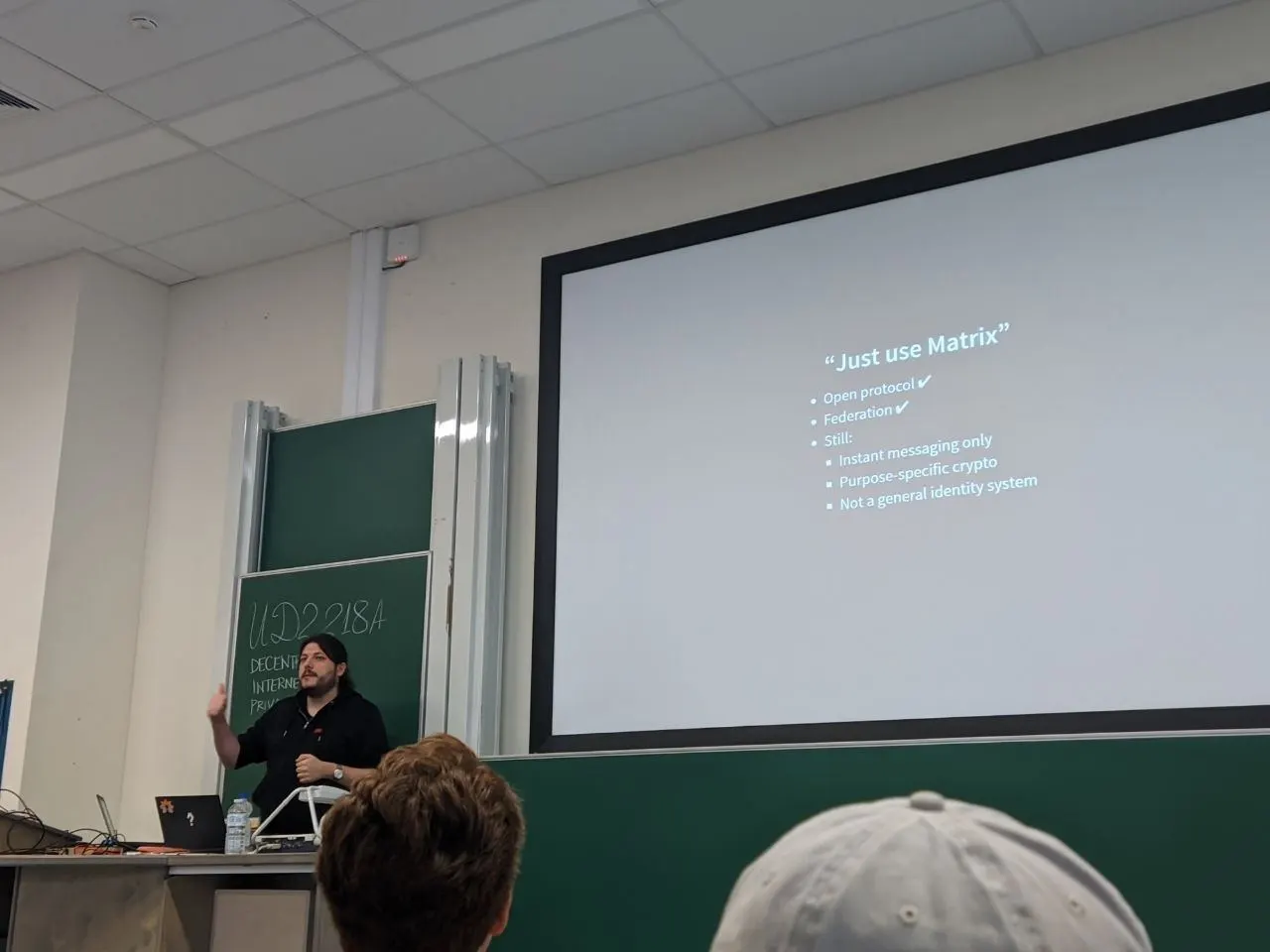 A picture in front of their slides saying "Just Use Matrix"